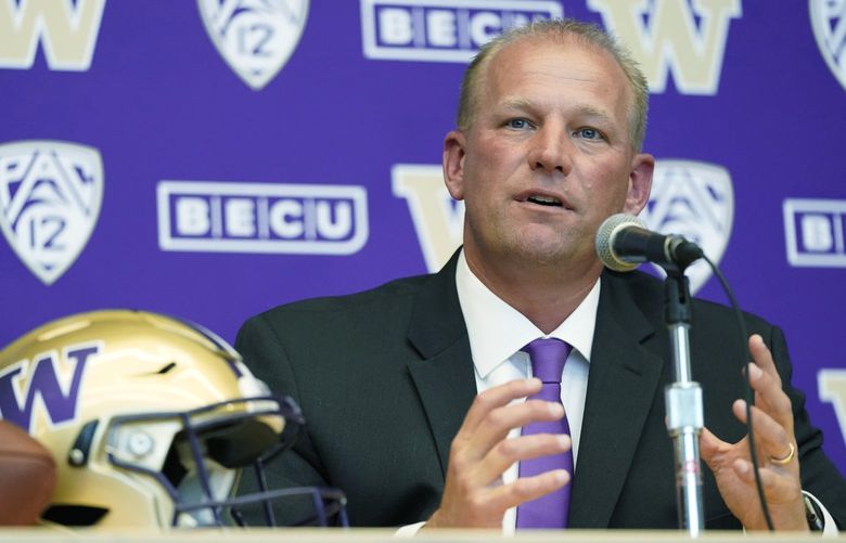 Kalen DeBoer speaks during a news conference, Tuesday, Nov. 30, 2021, in Seattle to introduce him as the new head NCAA college football coach at the University of Washington. DeBoer has spent the past two seasons as head football coach at Fresno State. (AP Photo/Ted S. Warren) WATW117 WATW117