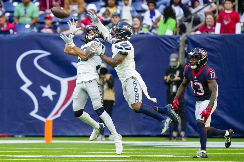 Seattle Seahawks strong safety Ryan Neal (26) runs off the field