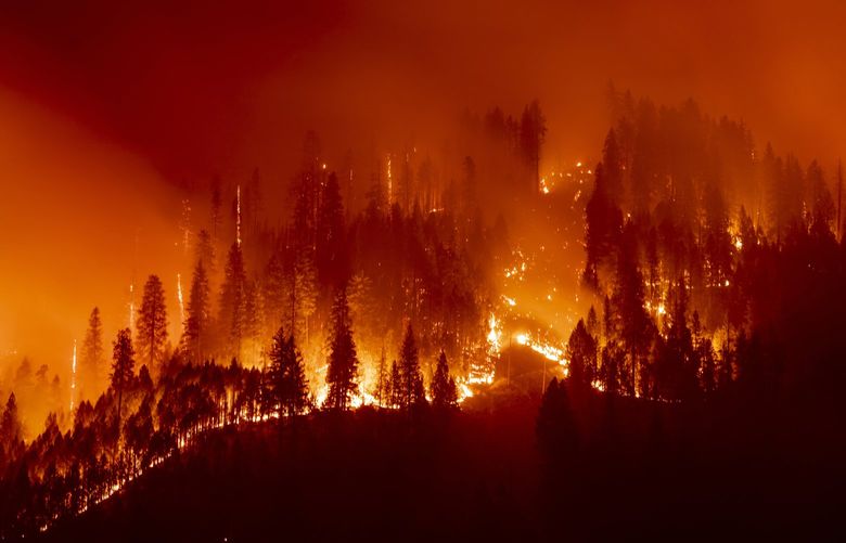 The Dixie Fire burns above Twain, California, July 26, 2021. MUST CREDIT: Photo for The Washington Post by Kyle Grillot