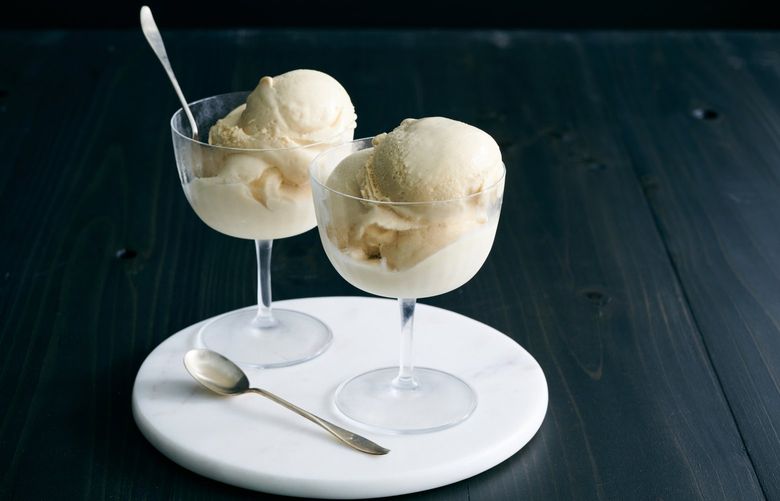 Coquito ice cream, flavored like the Puerto Rican holiday drink, at Torico Ice Cream in Jersey City, N.J., Dec. 8, 2021. The Berrios family has been serving scoops of their signature flavor since 1970. Food stylist: Simon Andrews. (David Malosh/The New York Times) XNYT69 XNYT69