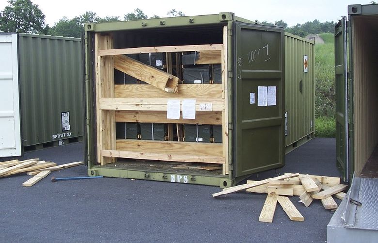 FILE – In this July 13, 2017, image provided by the U.S. Army Criminal Investigation Command on Feb. 9, 2021, a storage container of explosive ordnance shows signs of theft after arriving at the Letterkenny Army Depot in Chambersburg, Pa. An ammunition canister containing 32 rounds of 40mm M430A1 grenades, property of the U.S. Marine Corps, was missing. (U.S. Army Criminal Investigation Command via AP, File) NY791 NY791