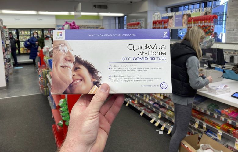 At-home COVID-19 test kits are for sale at a drug store in New York City on Wednesday, December 22, 2021. (AP Photo/Ted Shaffrey) RPTS101 RPTS101