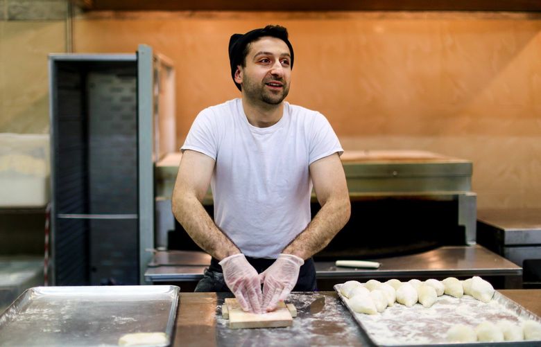 Nechirvan Zebari works at Alida’s Bakery in Everett, Wash. Tuesday, Oct. 15, 2019. Zebari founded the bakery in 2017, which offers Middle Eastern breads and sweets. It soon will expand to offer more Kurdish foods. 211816 211816