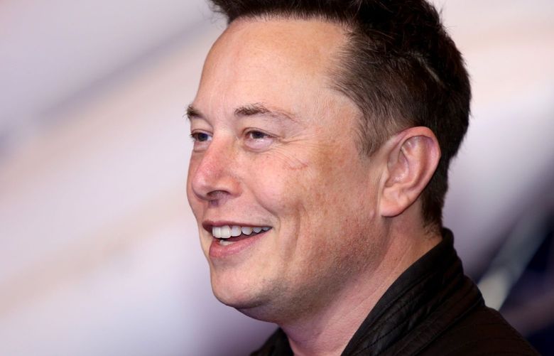 Elon Musk, founder of SpaceX and chief executive officer of Tesla Inc., arrives at the Axel Springer Award ceremony in Berlin, Germany, on Tuesday, Dec. 1, 2020. 