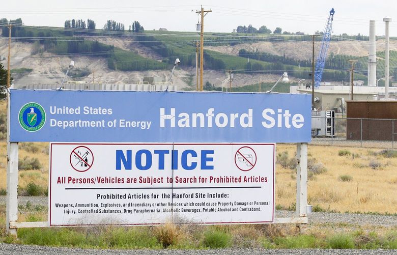 FILE – In this July 9, 2014 file photo, a sign informs visitors of prohibited items on the Hanford Site near Richland, Wash. The U.S. Department of Energy has confirmed that two underground structures at the decommissioned Hanford nuclear reservation in Washington state have been stabilized after they were deemed at risk of collapsing and spreading radioactive contamination into the air. (AP Photo/Ted S. Warren, File) FX204