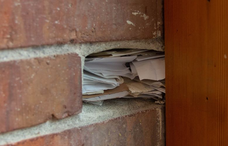Years’ worth of carefully folded notes are tucked into a corner at Miro Tea in Ballard.