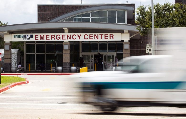 FILE – An ambulance is driven past the emergency entrance to Lyndon B. Johnson Hospital in Houston on Aug. 11, 2021. A new law does not prevent ambulance companies from billing you directly for their services if they travel on roads. (Annie Mulligan/The New York Times)