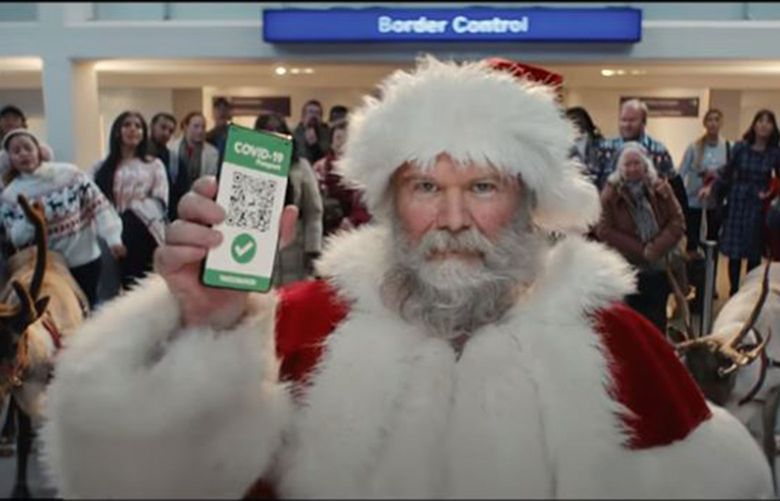 A commercial for Tesco featuring Santa holding a vaccine passport was deemed acceptable by British advertising regulators after viewers submitted complaints that the spot promoted vaccination. NYT