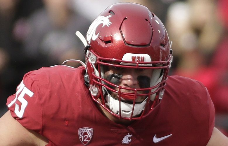 Washington State offensive lineman Cade Beresford (75) prepares to block during the first half of an NCAA college football game against BYU, Saturday, Oct. 23, 2021, in Pullman, Wash. (AP Photo/Young Kwak)