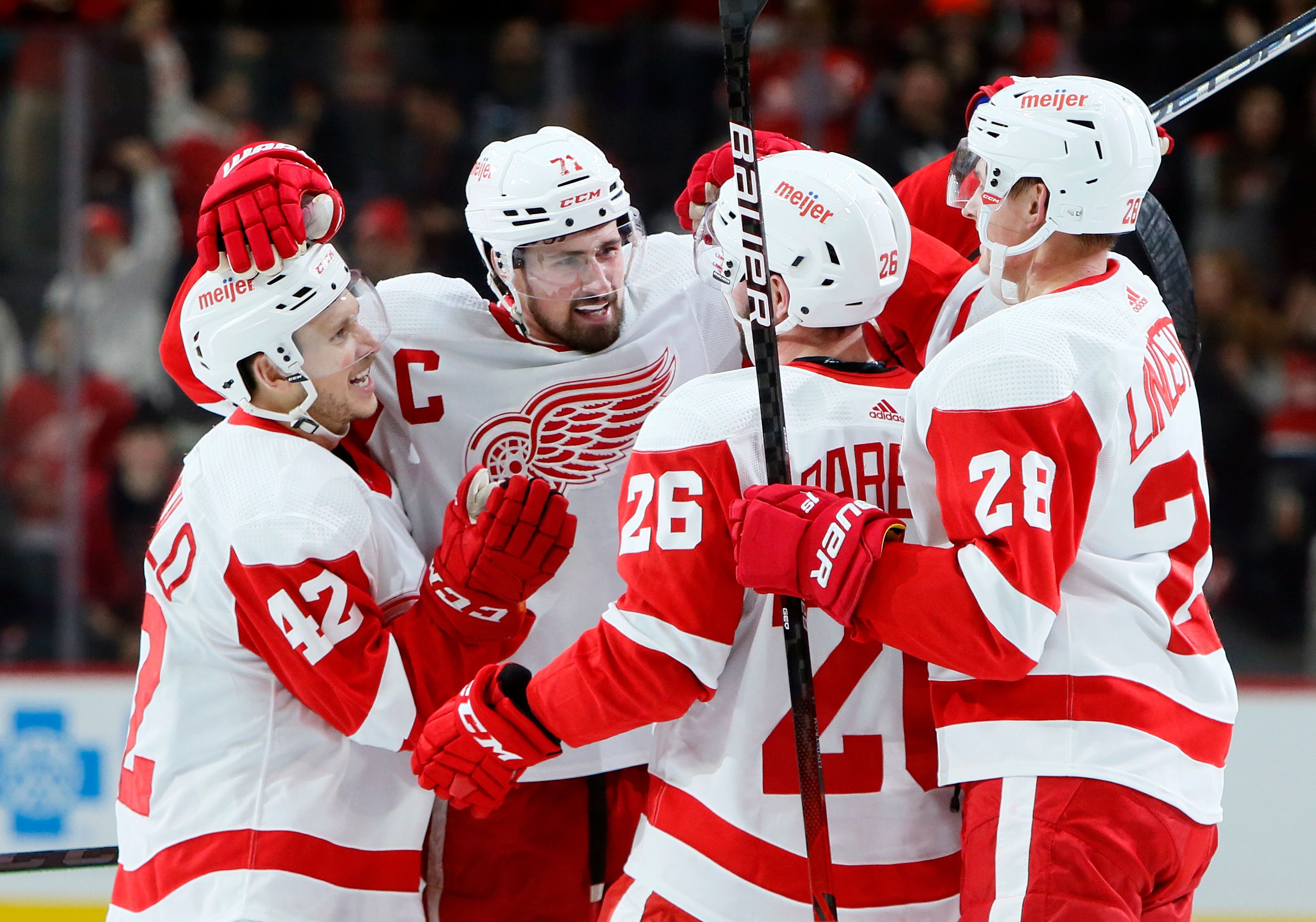 Larkin's first career hat trick powers Red Wings past Devils | The