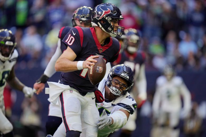 Wilson has 2 TD passes as Seahawks beat Texans 33-13