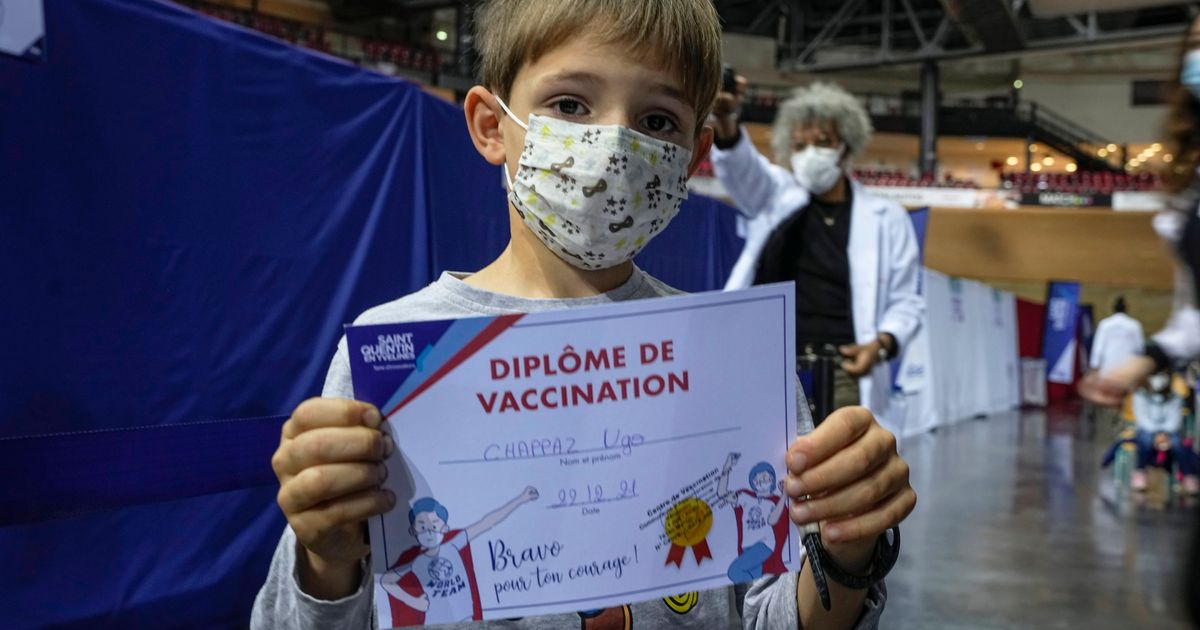 French kids line up to get vaccine shots as omicron spreads The