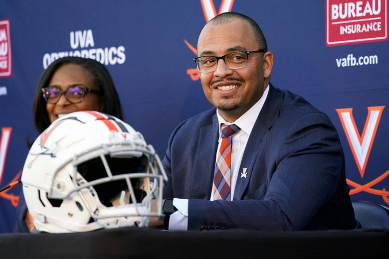Virginia QB Armstrong staying put in win for new coach | The Seattle Times