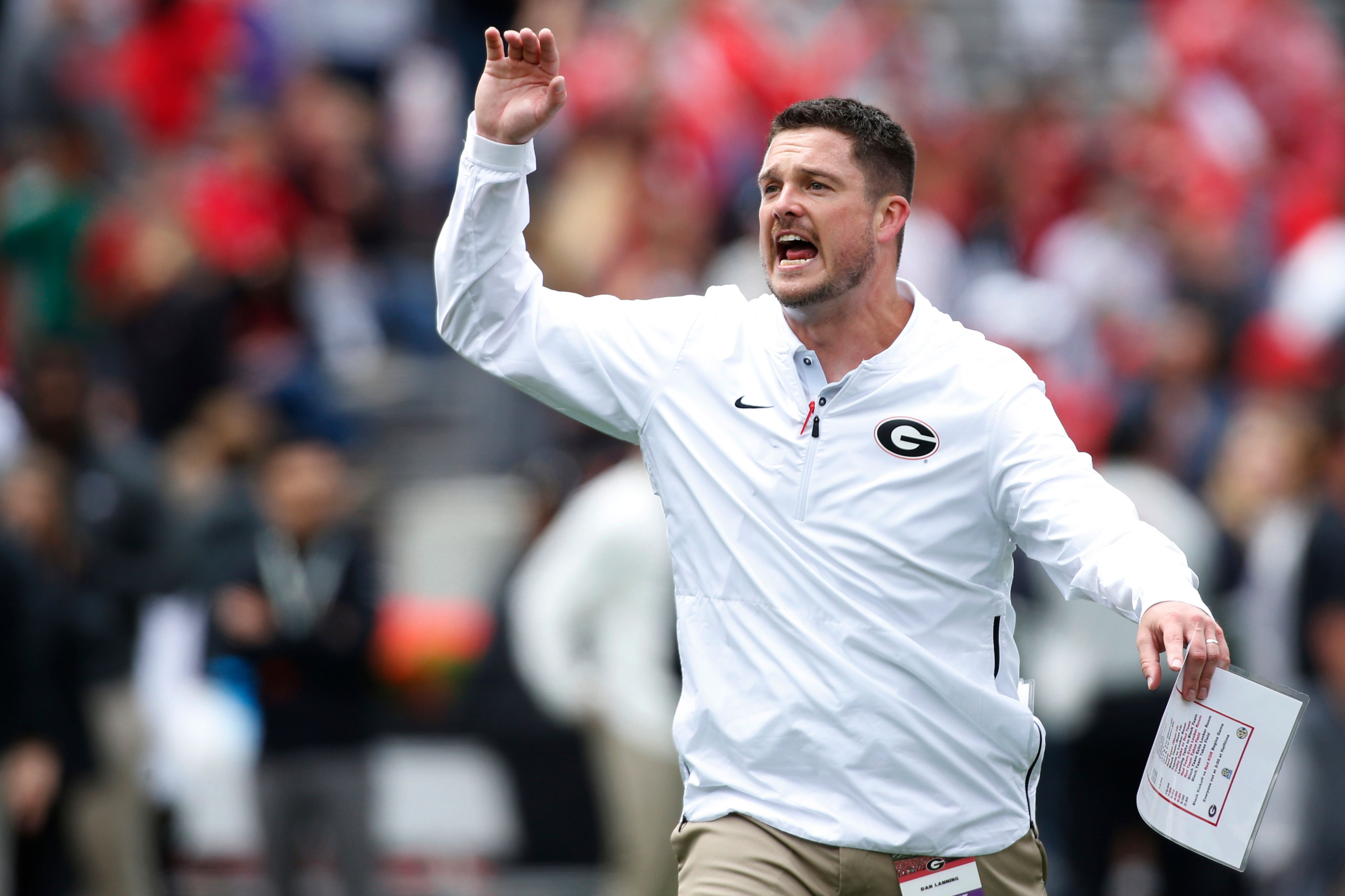 Oregon hires Georgia DC Dan Lanning as head coach | The Seattle Times