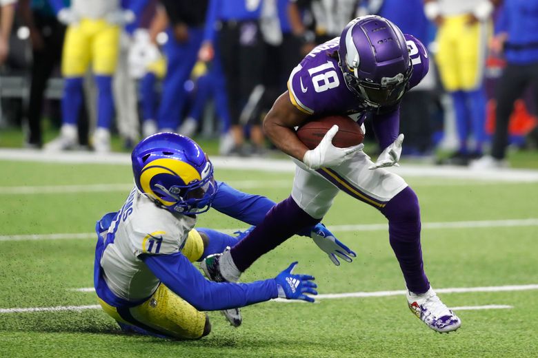 Minnesota Vikings wide receiver Justin Jefferson (18) runs during