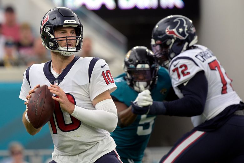 Houston Texans quarterback Davis Mills runs for a touchdown during