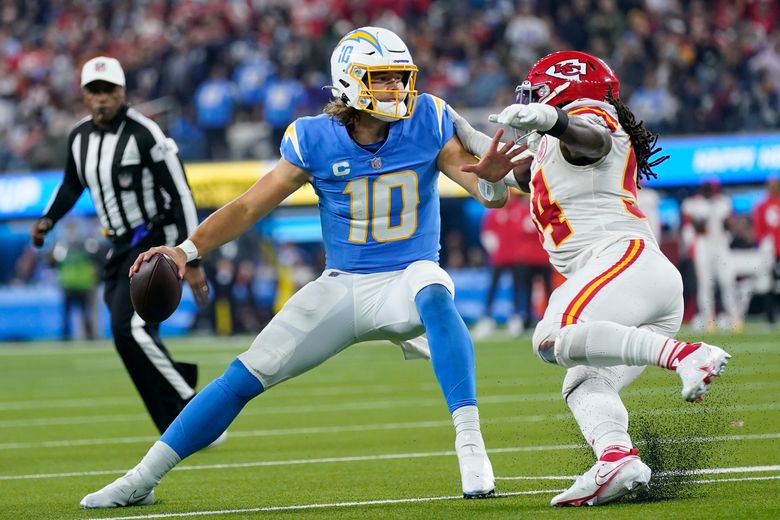 Los Angeles Chargers QB Justin Herbert and Dan Fouts