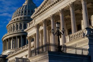 FILE – Light from the morning sun illuminates the Senate side of the Capitol in Washington, Dec. 3, 2021. The Senate is poised to vote Wednesday to void a Biden administration regulation that requires businesses with 100 or more workers have their workers vaccinated against the coronavirus or submit to weekly testing. (AP Photo/J. Scott Applewhite, File)