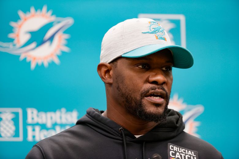 Miami Dolphins head coach Brian Flores watches the team drills during an  NFL football practice, …