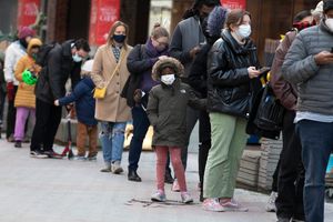 FILE – People wait in line outside a COVID-19 walk-in testing site, Sunday, Dec. 5, 2021, in Cambridge, Mass. Even as the U.S. reaches a COVID-19 milestone of roughly 200 million fully-vaccinated people, infections and hospitalizations are spiking, including in highly-vaccinated pockets of the country like New England. (AP Photo/Michael Dwyer, File)