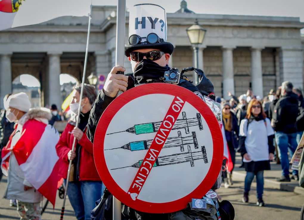 FILE – A man takes part in a demonstration against the country’s coronavirus restrictions in Vienna, Austria, Saturday, Nov. 20, 2021. The coronavirus’s omicron variant kept a jittery world off-kilter Wednesday Dec. 1, 2021, as reports of infections linked to the mutant strain cropped up in more parts of the globe, and one official said that the wait for more information on its dangers felt like “an eternity.” (AP Photo/Lisa Leutner, File)