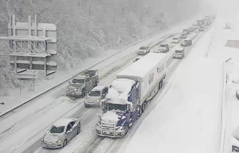 This image provided by the Virginia department of Transportation shows a closed section of Interstate 95 near Fredericksburg, Va. Monday Jan. 3, 2022. Both northbound and southbound sections of the highway were closed due to snow and ice. (Virginia Department of Transportation via AP) RIC101 RIC101