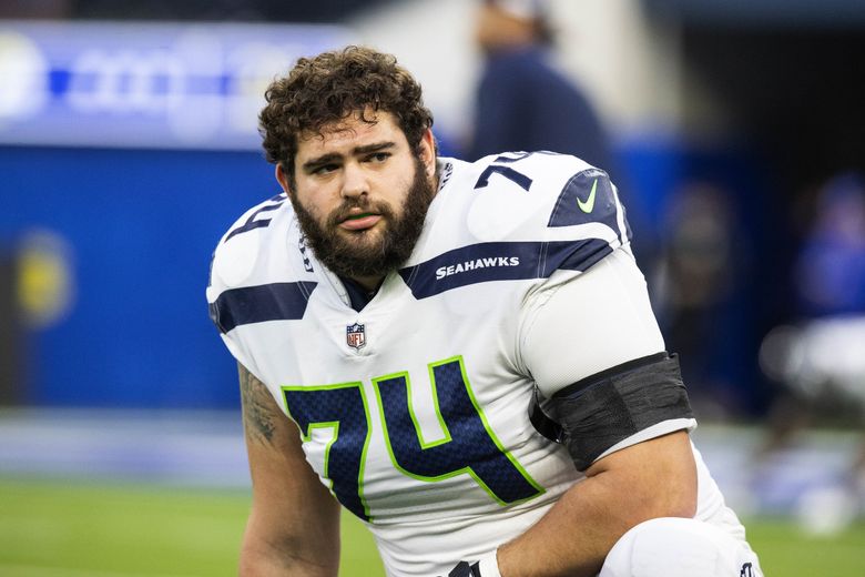 Seattle Seahawks guard Damien Lewis warms up before an NFL