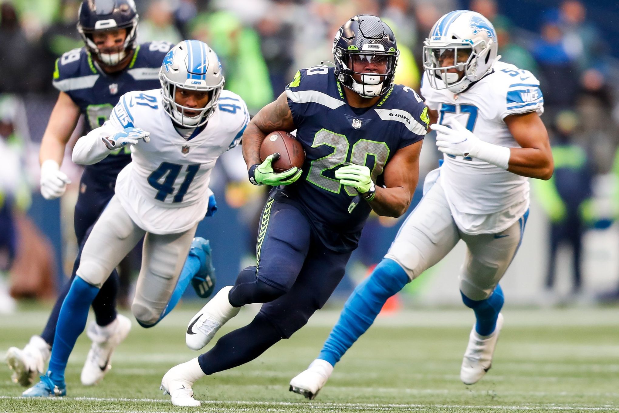 Current Seattle Seahawk and Norwalk Alum Rashaad Penny and Brother  Elijhaa's Jerseys Retired