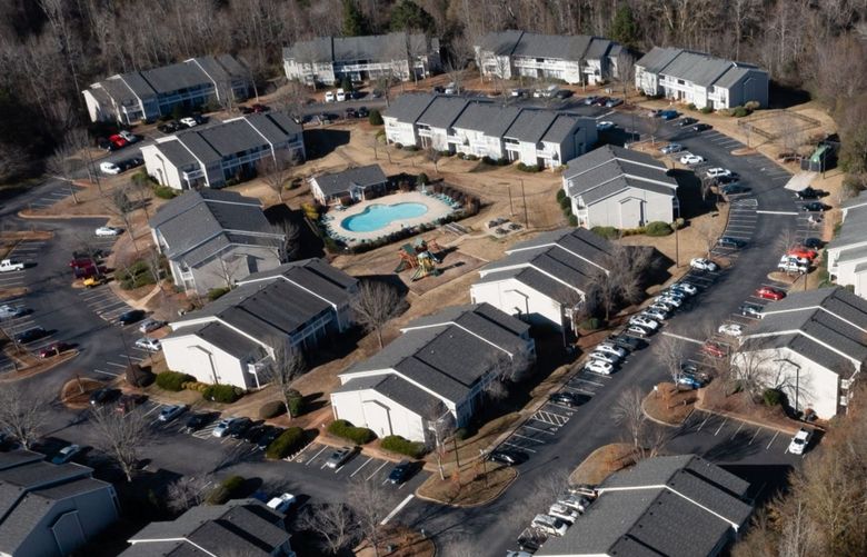 Homes in the Creekwood Station subdivision in McDonough, Georgia, on Dec. 12, 2021. Much of the town sits in one of the ZIP codes where iBuyers are most active nationally, selling more than 100 homes last year with about 70% of those houses going to investors. (Elijah Nouvelage / Bloomberg)