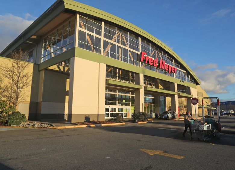 A new survey of more than 10,000 unionized Kroger grocery workers in the Western United States finds that 78% sometimes struggling to afford basic necessities like food and shelter. Here the Ballard Fred Meyer is seen. (Greg Gilbert / The Seattle Times)