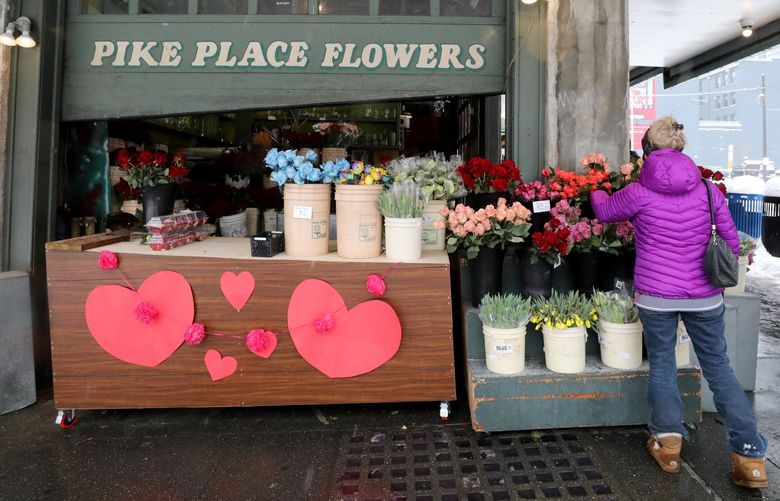 Pike Place Flowers is a bright spot in the Pike Place Market the day before Valentine’s Day.
Snow in Seattle,
Saturday Feb 13, 2021 216405