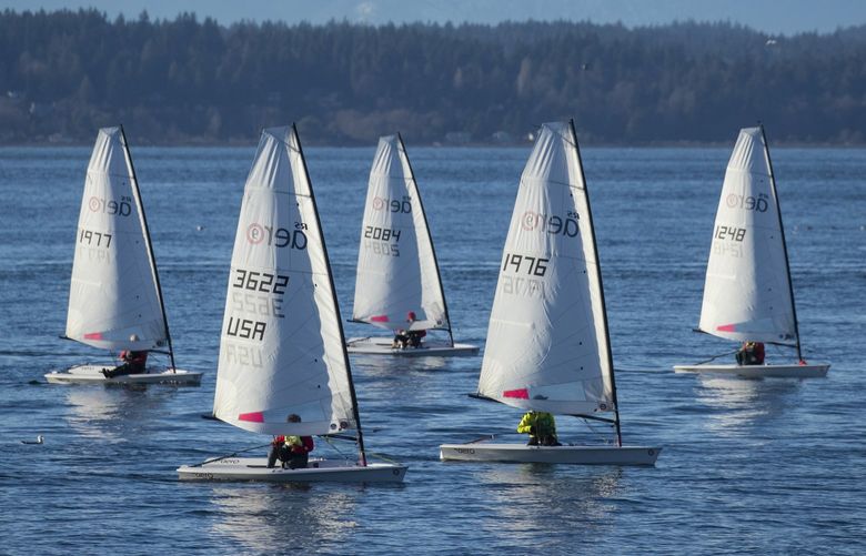 With the sun out and a break from the rain, sailboats venture out into Shilshole Bay on Sunday, Jan. 9, 2022. LO