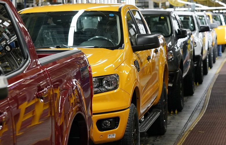 FILE – Model year 2021 Ford Ranger trucks on the assembly line at Michigan Assembly, Monday, June 14, 2021, in Wayne, Mich. U.S. industrial production increased 0.5% in November 2021 as output at the nation’s factories reached the highest level since January 2019.(AP Photo/Carlos Osorio)