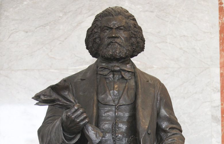 FILE – A stature of Frederick Douglass that will be exhibited on Capitol Hill in Washington, Sept. 13, 2012. A Republican legislator in Virginia who campaigned against critical race theory introduced a bill that incorrectly said the Lincoln-Douglas debates were between Abraham Lincoln and Frederick Douglass. (Ozier Muhammad/The New York Times)