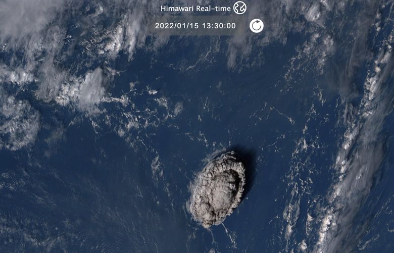 This satellite image taken by Himawari-8, a Japanese weather satellite operated by Japan Meteorological Agency and released by National Institute of Information and Communications Technology (NICT), shows an undersea volcano eruption at the Pacific nation of Tonga Saturday, Jan. 15, 2022. (NICT via AP) TOK604 TOK604