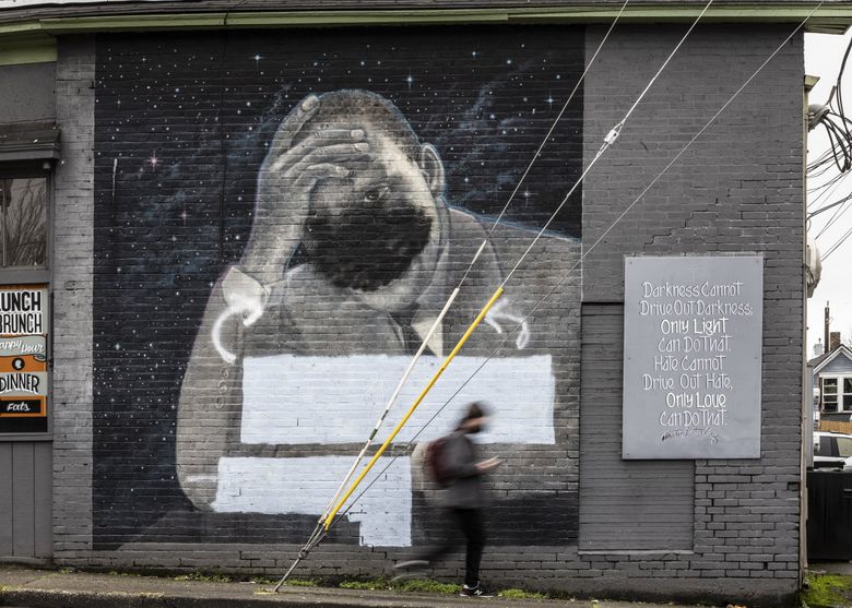 The mural of Martin Luther King Jr. on Fat’s Chicken and Waffles on East Cherry Street in the Central District was vandalized this week. (Steve Ringman / The Seattle Times)
