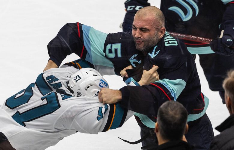 Mark Giordano lays into Adam Raska, and draws the 5-minute penalty for fighting in the 2nd period.

The San Jose Sharks played the Seattle Kraken Thursday, January 20, 2022 at Climate Pledge Arena, in Seattle, WA. 219271
