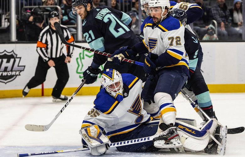 Alex Wennberg and the Kraken get St. Louis goalie Ville Husso on his back, but can’t make a shot in the 1st period.

The St. Louis Blues played the Seattle Kraken Friday, January 21, 2022 at Climate Pledge Arena in Seattle, WA. 219272