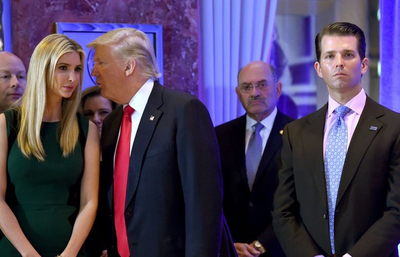In this file photo from Jan. 11, 2017, US President-elect Donald Trump along with his children Eric, left, Ivanka and Donald Jr. arrive for a press conference at Trump Tower in New York, accompanied by Allen Weisselberg (second from right), chief financial officer of The Trump Organization.(Timothy A. Clary/AFP/Getty Images/TNS) 37983906W 37983906W