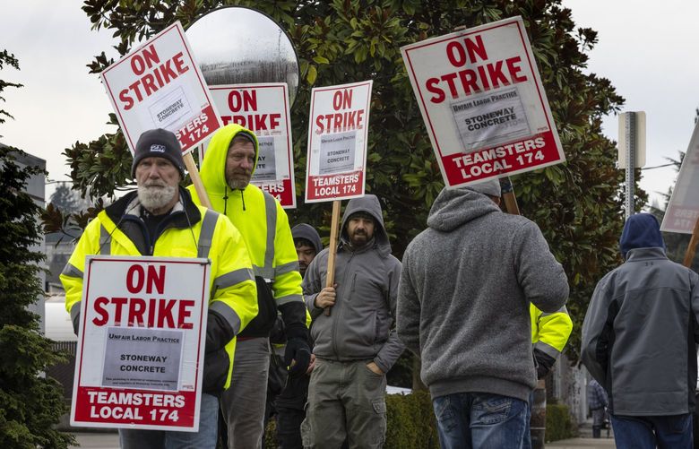 On Friday, January 14, 2022, striking concrete mixer truck drivers with Local #174 picket in front of Stoneway Concrete headquarters, located at 9125 10th Ave. S, Seattle. The strike has halted some construction projects across the region.
219335