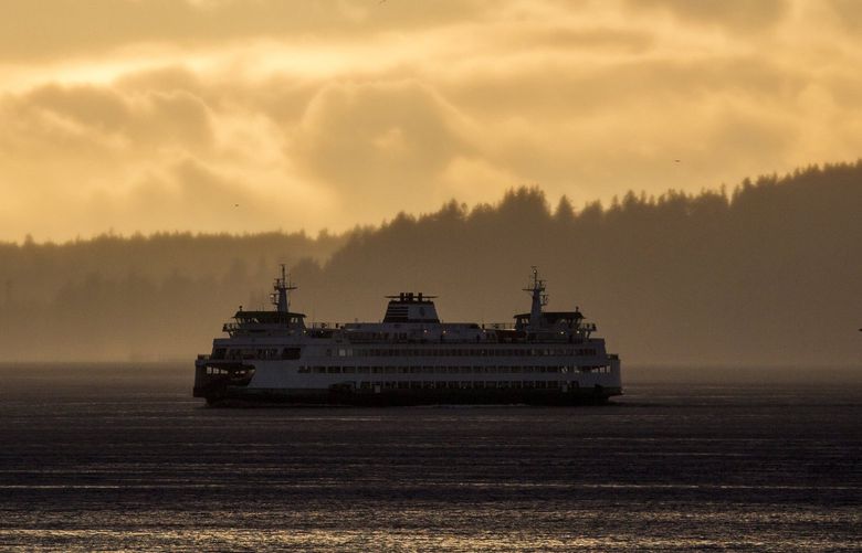 A ferry travels across the Puget Sound on Tuesday evening.
Tuesday, Feb. 23, 2021.
LO 216484