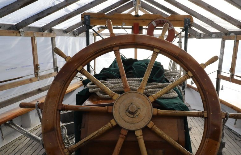 The wheel is of teak, mahogany and oak.  It’s located near the stern so a person at the helm stands behind it with a view of the entire deck ahead.  The wheel is composed of 40 different pieces of wood.

LO Schooner Zodiac in South Lake Union for maintenance work

Thurs-Fri-Sat January 13-14-15, 2022 219340