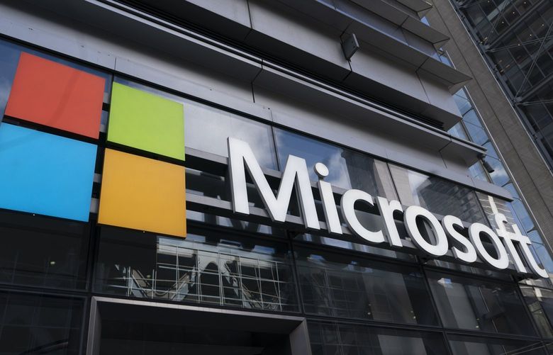 A sign for Microsoft offices, in New York. (AP Photo/Mark Lennihan) NYBZ306 NYBZ306