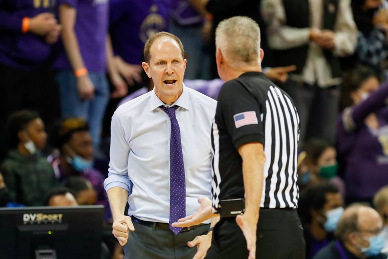 Washington Huskies head coach Mike Hopkins talks to a referee during the second half against Northern Illinois Huskies, Nov. 9, 2021, in Seattle. (Jennifer Buchanan / The Seattle Times)