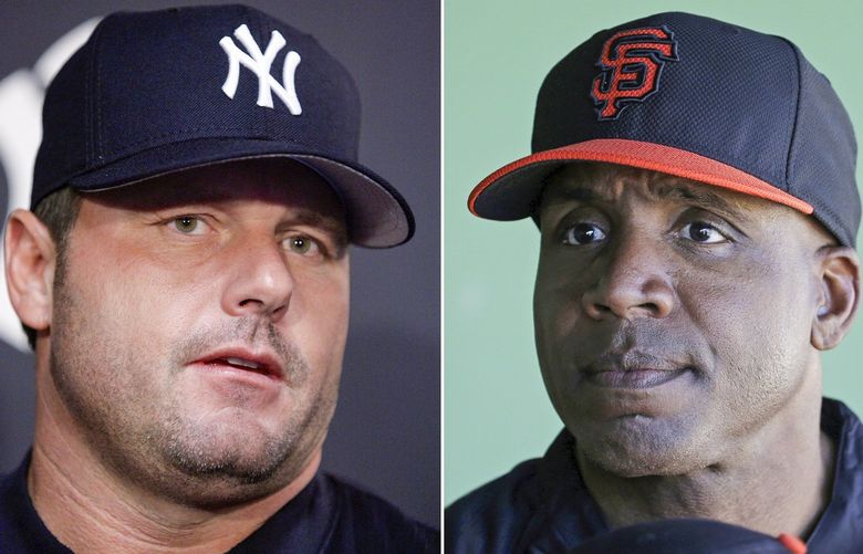 FILE – At left is a 2007 file photo showing New York Yankees baseball player Roger Clemens. At right is a 2014 file photo showing former San Francisco Giants baseball player Barry Bonds. Bonds and Clemens will probably have to wait a little longer to get into the Baseball Hall of Fame.  (AP Photo/File) NY163