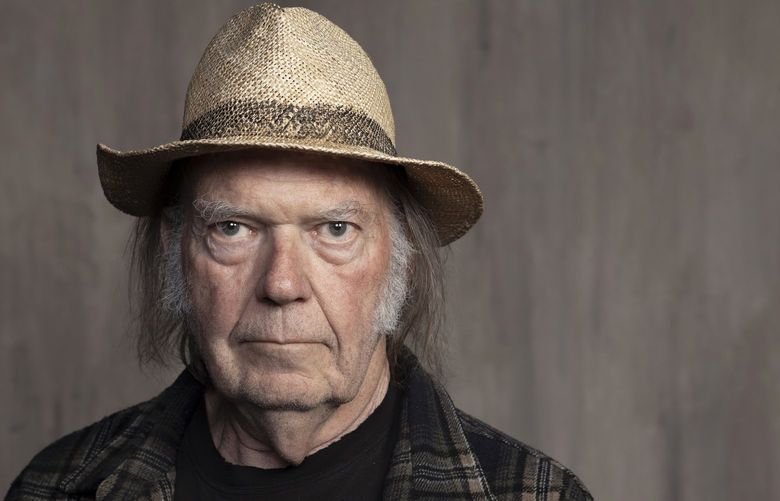 FILE – Neil Young poses for a portrait in Santa Monica, Calif. on Sept. 9, 2019. Spotify says it will grant the veteran rocker’s request to remove his music from its streaming platform. Young made the request as a protest to what he called the company’s decision to allow COVID-19 misinformation to spread on its service. (Photo by Rebecca Cabage/Invision/AP, File) CAPM301 CAPM301