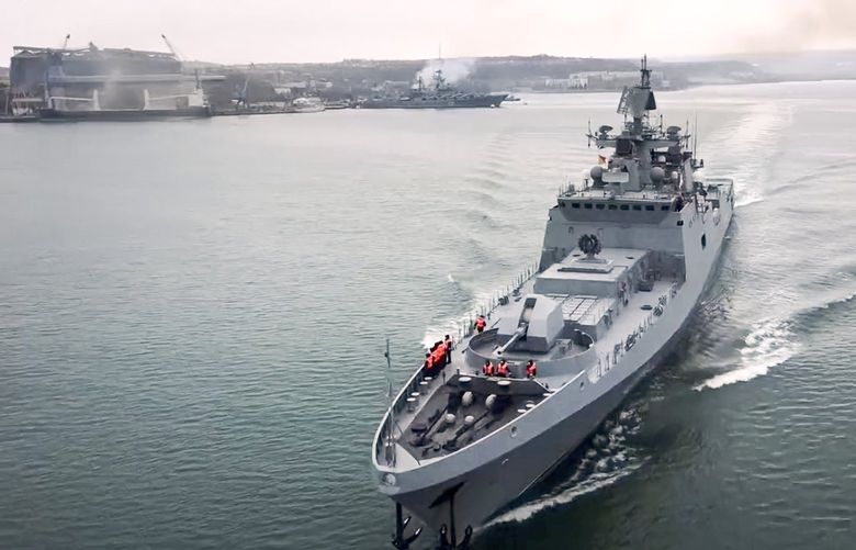In this photo taken from video and released by the Russian Defense Ministry Press Service on Wednesday, Jan. 26, 2022, The Russian navy’s frigate Admiral Essen prepares to sail off for an exercise in the Black Sea. Russia has launched a series of drills amid the tensions over Ukraine and deployed an estimated 100,000 troops near the Ukrainian territory that fueled Western fears of an invasion. (Russian Defense Ministry Press Service via AP) XAZ111 XAZ111
