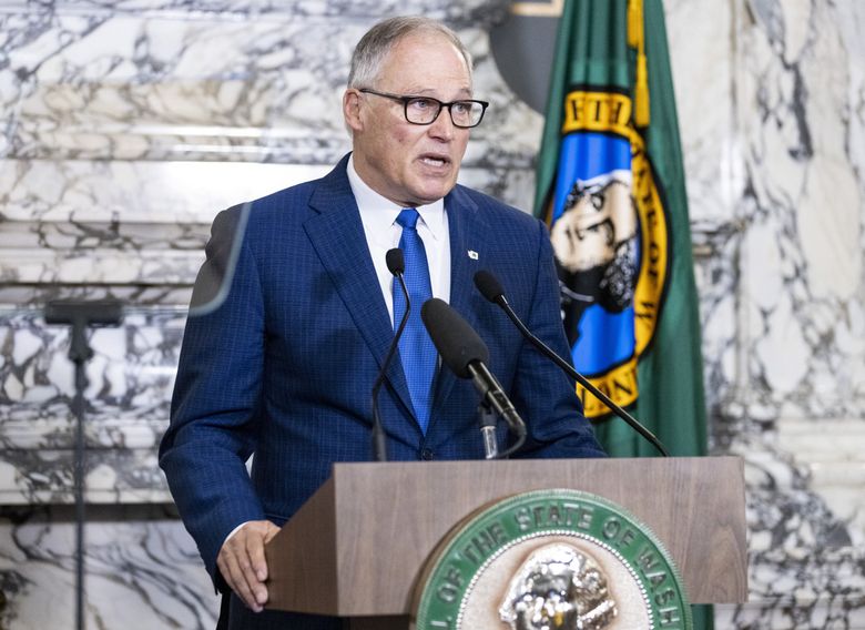 Washington Gov. Jay Inslee delivers his 2022 State of the State address at the Capitol in Olympia on Tuesday, Jan. 11, 2022. He signed two bills Thursday, Jan. 27, 2022, that delays and changes the WA Cares long-term care program. (Amanda Snyder / The Seattle Times)