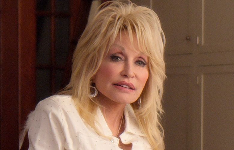 Dolly Parton and Jeanine Mason in “Dolly Parton’s Christmas on the Square.”