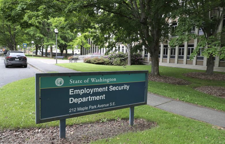This photo shows a sign at the headquarters for Washington state’s Employment Security Department Tuesday, May 26, 2020, at the Capitol in Olympia, Wash. Washington state’s rush to get unemployment benefits to residents who lost jobs due to the coronavirus outbreak left it vulnerable to criminals who made off with hundreds of millions of dollars in fraudulent claims. (AP Photo/Ted S. Warren) WATW102